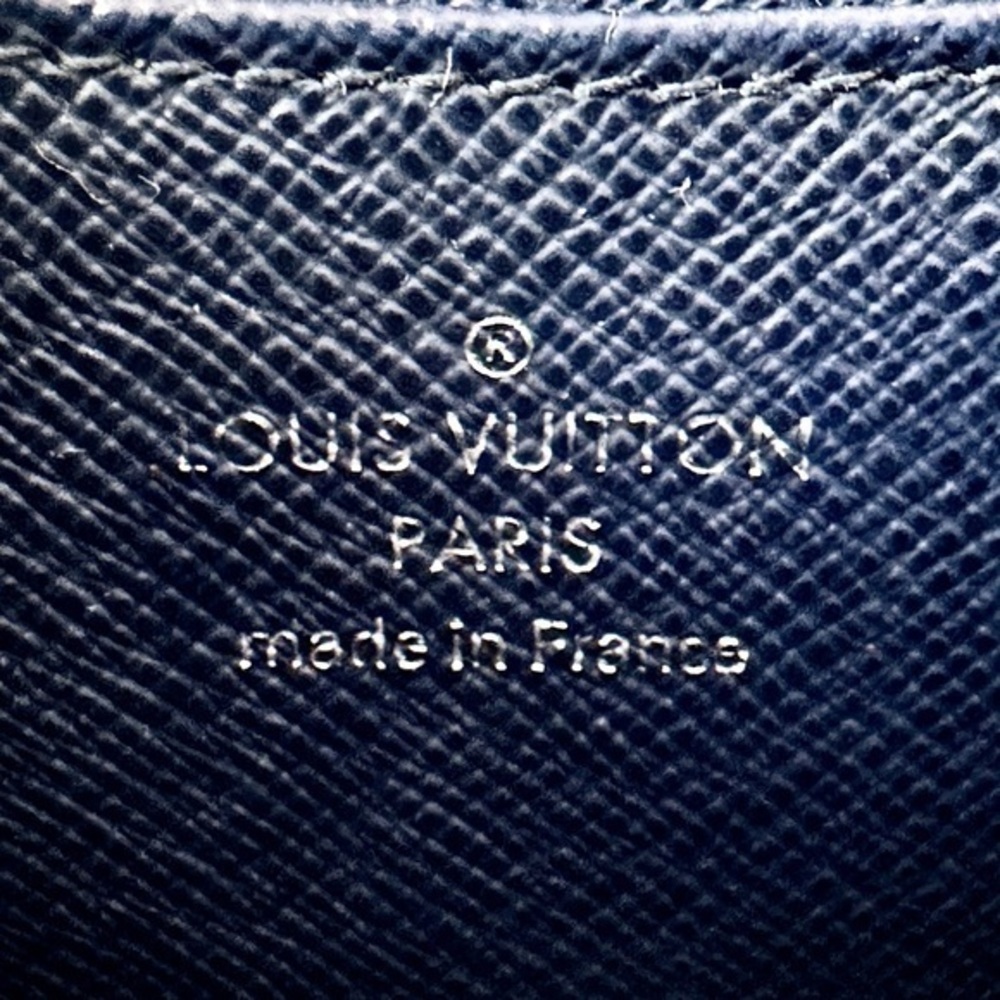 AUTHENTIC Louis Vuitton wallet. Preowned. Color: Navy blue. - Picture 9 of 12